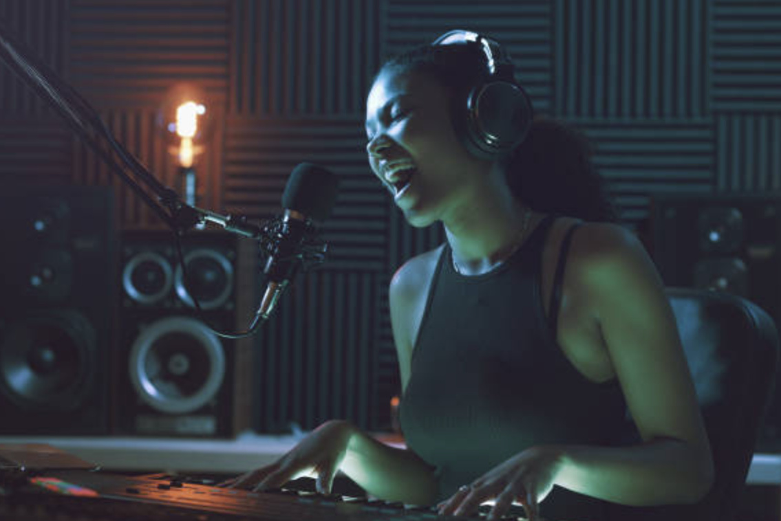 Artist singing to microphone